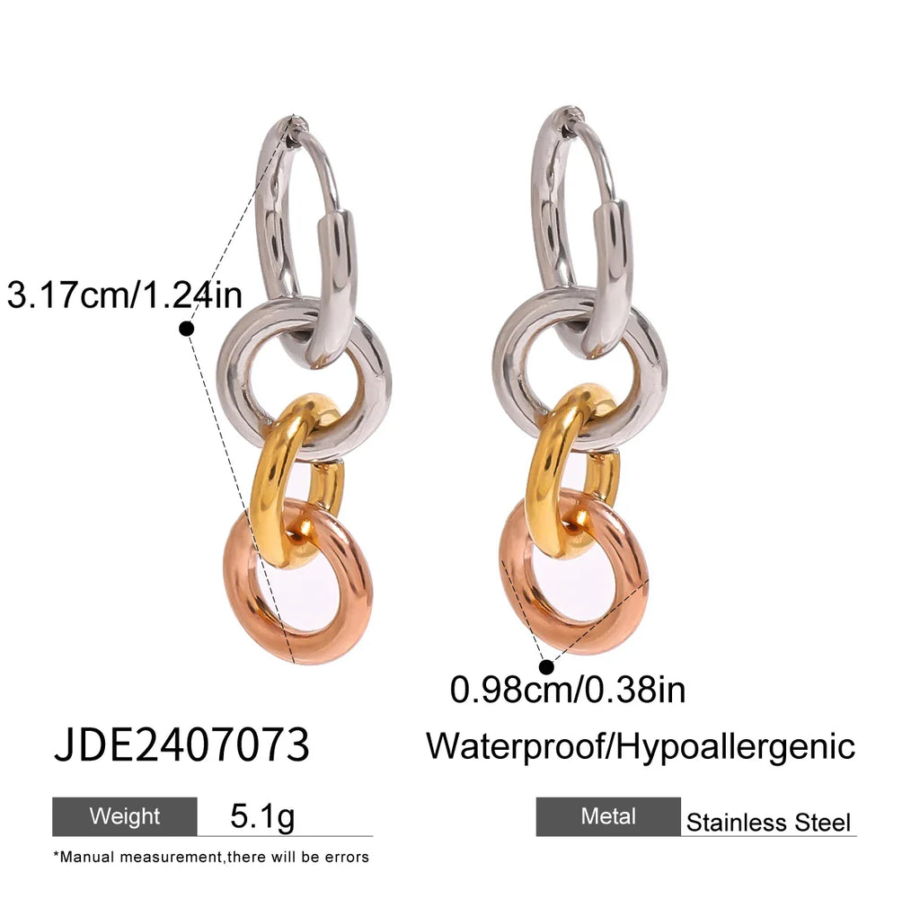 Große, silberfarbene Creolen aus Edelstahl, 18 Karat PVD-plattiertes Metall mit Golddetails, ideal für Damen und Allergiker.