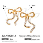 Minimalistische Ohrringe mit Schleife und goldener Quaste aus 18-karätig PVD-beschichtetem Edelstahl, wasserfest, hochwertig und attraktiver Schmuck