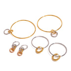 Große, silberfarbene Creolen aus Edelstahl, 18 Karat PVD-plattiertes Metall mit Golddetails, ideal für Damen und Allergiker.